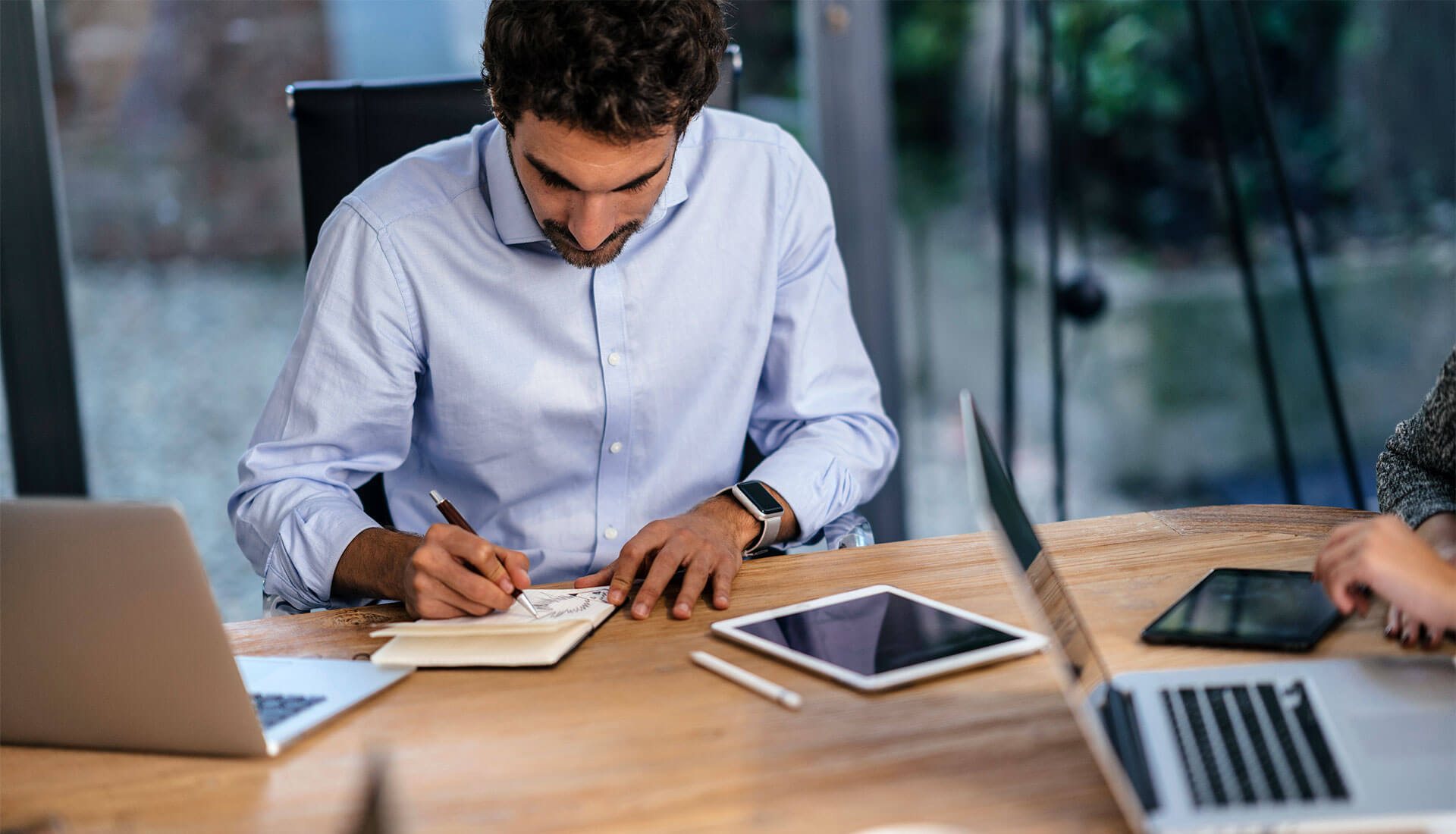 Business owner reviewing plans at a table